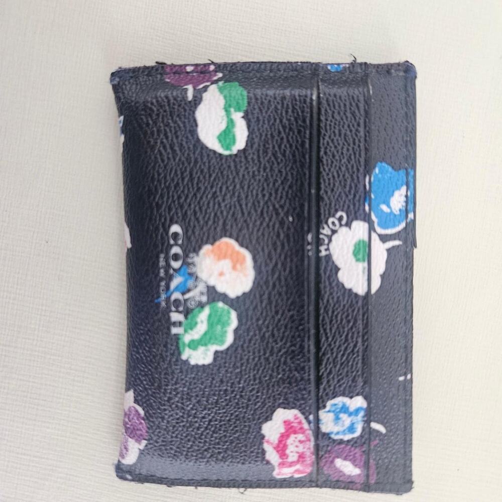 Coach black floral card holder